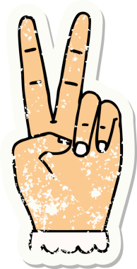 Bir barış sembolünün grunge sticker 'ı Bir insan tarafından çizilmiş iki parmak el hareketi