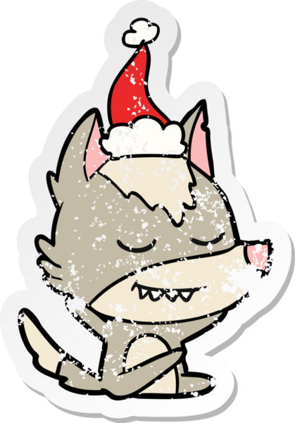 Dost canlısı el, bir insan tarafından çizilmiş Noel Baba şapkası takan bir kurt çıkartması çizmiş.