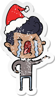 Bir insan tarafından çizilmiş, ağlayan, Noel Baba şapkası takan, kederli bir adamın çıkartması.