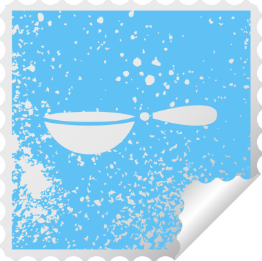 Bir insan tarafından çizilmiş bir kaşığın kare soyma etiketi.