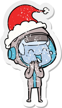 Mutlu el, bir astronotun Noel Baba şapkası giymiş bir insan tarafından çizilmiş üzgün çıkartması.