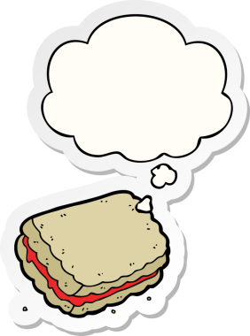 Düşünce baloncuklu çizgi film bisküvisi insan tarafından çizilmiş bir çıkartma.