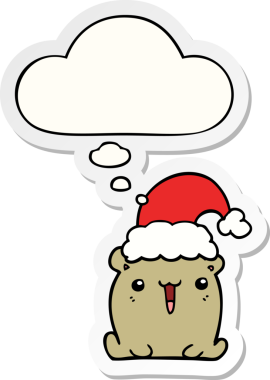 Düşünce baloncuklu Noel şapkalı şirin çizgi film ayısı bir insan tarafından çizilmiş çıkartma gibi.