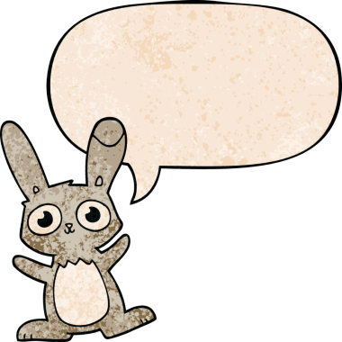 Konuşma baloncuğu olan sevimli çizgi film tavşanı insan tarafından çizilmiş.
