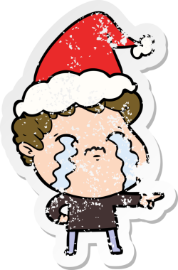Bir insanın çizdiği Noel Baba şapkasıyla ağlayan bir adamın el yazısı.