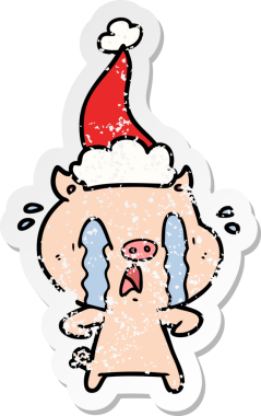 Ağlayan domuz eli, bir insan tarafından çizilmiş Noel Baba şapkasının çizilmiş çıkartması.