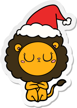 Bir insan tarafından çizilmiş Noel Baba şapkası takan bir aslanın el yazısı.