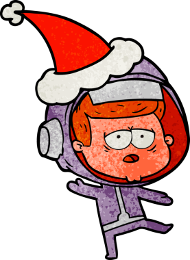Bir insan tarafından çizilmiş Noel Baba şapkası giymiş yorgun bir astronotun el çizimi karikatürü.