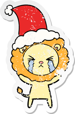 Bir insan tarafından çizilmiş Noel Baba şapkası giymiş ağlayan bir aslanın el yazısı.