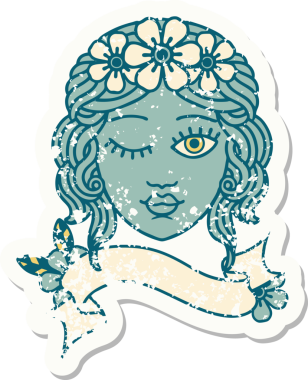 Bir insan tarafından çizilmiş, üzerinde bakirelerin yüzü olan eski bir çıkartma.