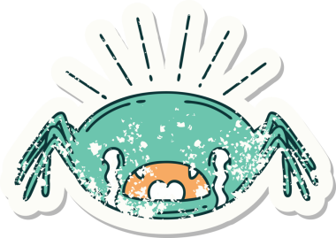 Bir insan tarafından çizilmiş ağlayan örümcek dövmesinin eski bir çıkartması.