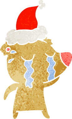 Bir insan tarafından çizilmiş Noel Baba şapkası giymiş ağlayan bir ayının el çizimi karikatürü