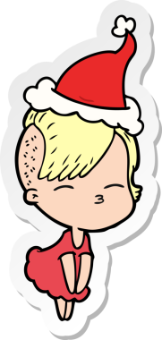 Bir insan tarafından çizilmiş Noel Baba şapkası giyen şaşı bir kızın el yazısı.