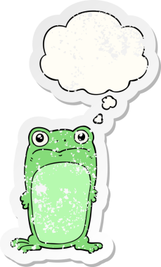 Düşünce baloncuğu olan karikatür bakışlı kurbağa, insan tarafından çizilmiş yıpranmış bir çıkartma.