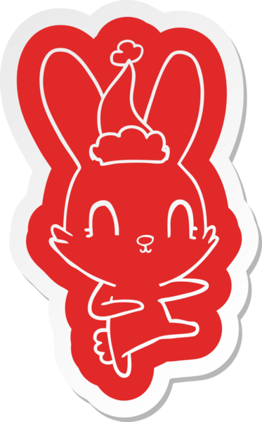 Bir insan tarafından çizilmiş Noel Baba şapkasıyla dans eden tavşan çıkartması.