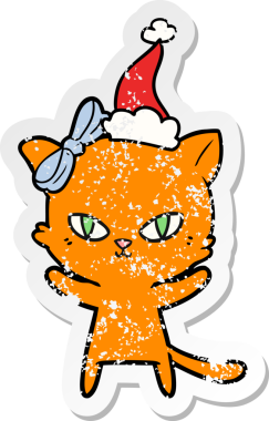 Bir insan tarafından çizilmiş Noel Baba şapkası takan bir kedi çizilmiş.