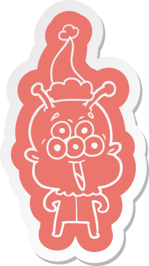 Bir insan tarafından çizilmiş Noel Baba şapkası giyen bir uzaylının komik çizgi film çıkartması.