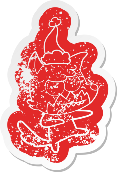 Bir insan tarafından çizilmiş Noel Baba şapkası giymiş sırıtan tilki çıkartması.