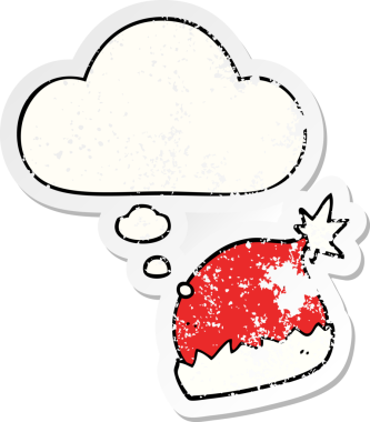 Düşünce baloncuklu çizgi film Noel Baba şapkası bir insan tarafından çizilmiş yıpranmış bir çıkartma.