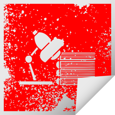 Bir insan tarafından çizilmiş çalışma kitabı ve lambanın kare soyma etiketi.