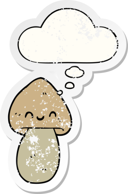 Düşünce baloncuğu olan karikatür mantarı insan tarafından çizilmiş yıpranmış bir çıkartma.