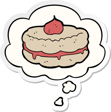 Düşünce baloncuklu çizgi film bisküvisi insan tarafından çizilmiş bir çıkartma.