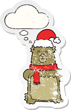 Düşünce baloncuklu Noel şapkası takan çizgi film ayısı insan tarafından çizilmiş yıpranmış bir çıkartma.