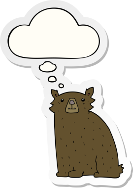 İnsan tarafından çizilmiş bir çıkartma olarak düşünce baloncuğu olan çizgi film ayısı.