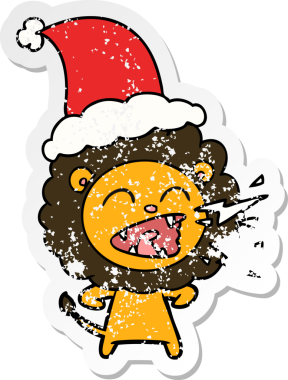 Kükreyen bir aslanın insan tarafından çizilmiş Noel Baba şapkasıyla çizilmiş bir karikatür.