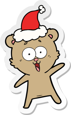 Gülen ayıcık eli çizilmiş bir insan tarafından çizilmiş Noel Baba şapkası.