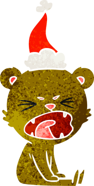 Kızgın el, bir insan tarafından çizilmiş Noel Baba şapkası takan bir ayının eski çizgi filmini çizdi.