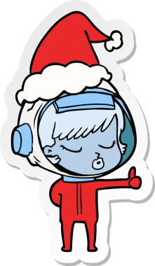 Bir insan tarafından çizilmiş Noel Baba şapkası takan güzel astronot bir kızın el yazısı.