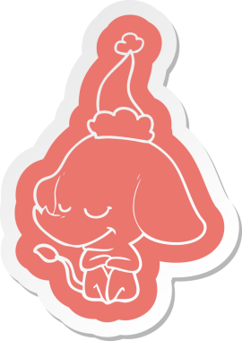 Bir insan tarafından çizilmiş Noel Baba şapkası takan gülümseyen bir filin garip çizgi film çıkartması.