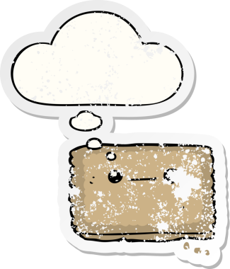 Düşünce baloncuklu çizgi film bisküvisi insan tarafından çizilmiş yıpranmış bir çıkartma.