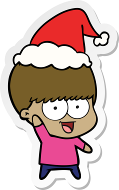 Bir insan tarafından çizilmiş Noel Baba şapkası takan bir çocuğun mutlu el çizimi karikatürü.