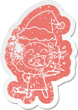 Kükreyen aslan kızın insan tarafından çizilmiş Noel Baba şapkası giydiği garip bir karikatür.