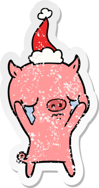 Bir insan tarafından çizilmiş Noel Baba şapkasıyla ağlayan bir domuzun el yazısı.