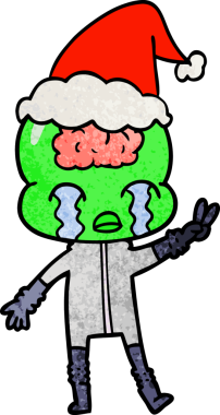 Bir insan tarafından çizilmiş Noel Baba şapkasıyla ağlayan ve barış işareti yapan büyük beyinli bir uzaylının el çizimi karikatürü.