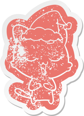 Mutlu bir çizgi film. Bir insan tarafından çizilmiş Noel Baba şapkası takan bir kedinin hüzünlü çıkartması.