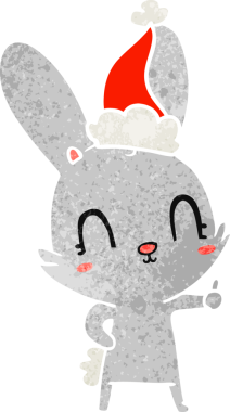 Bir insan tarafından çizilmiş Noel Baba şapkası takan eski bir tavşan çizimi.