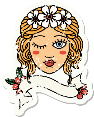 Bir insan tarafından çizilmiş, üzerinde bakirelerin yüzü olan eski bir çıkartma.