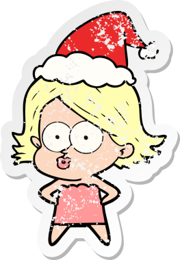 Bir insanın çizdiği Noel Baba şapkasıyla somurtan bir kızın el yazısı.