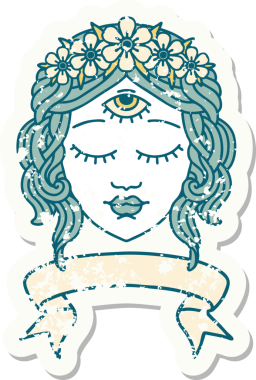 Üçüncü gözü ve bir insan tarafından çizilmiş çiçek taçlı bayrak takılmış eski bir çıkartma.