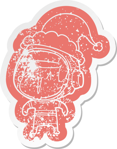 Garip bir çizgi film, Noel Baba şapkası takan astronot bir adamın insan tarafından çizilmiş çıkartması.