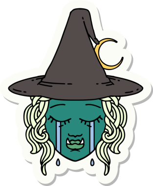 Bir insan tarafından çizilmiş ağlayan yarı ork bir cadı yüzü çıkartması.