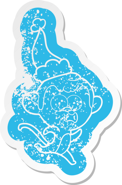 Garip bir çizgi film, insan tarafından çizilmiş Noel Baba şapkası takan şaşırmış bir maymunun çıkartması.