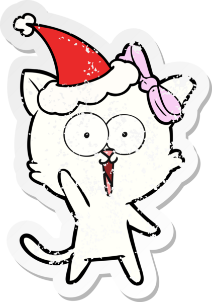 Bir insan tarafından çizilmiş Noel Baba şapkası takan bir kedinin çizilmiş el yazısı.