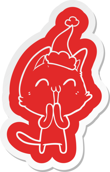 Bir insan tarafından çizilmiş Noel Baba şapkası takan bir kedinin komik çizgi film çıkartması.