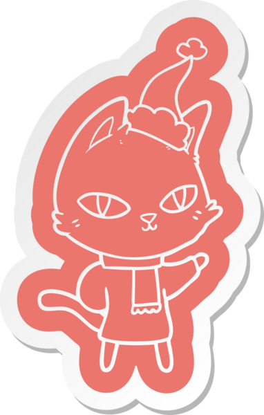 Bir insan tarafından çizilmiş Noel Baba şapkası takan bir kedinin garip çizgi film çıkartması.