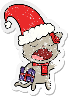 Bir insan tarafından çizilmiş Noel hediyeli bir çizgi film kedisinin sıkıntılı çıkartması.